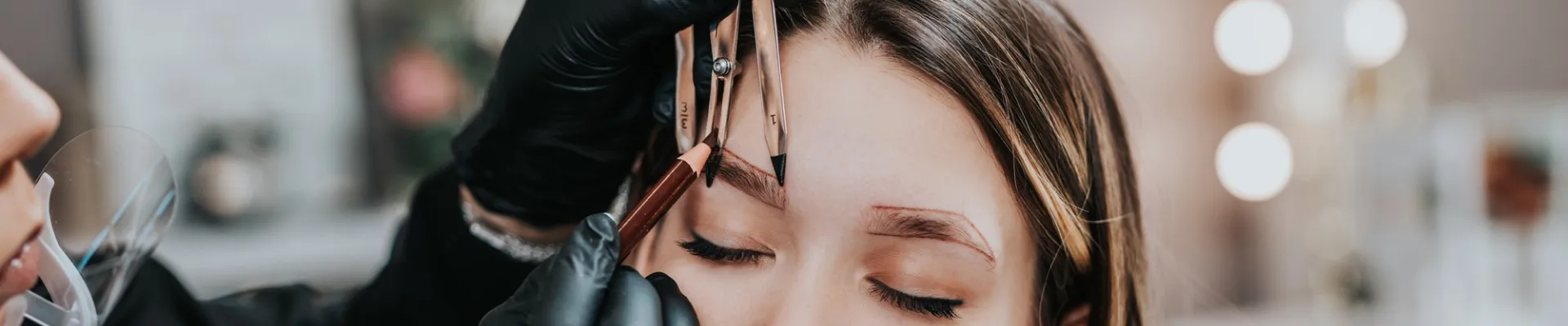 artist working on a client in a studio